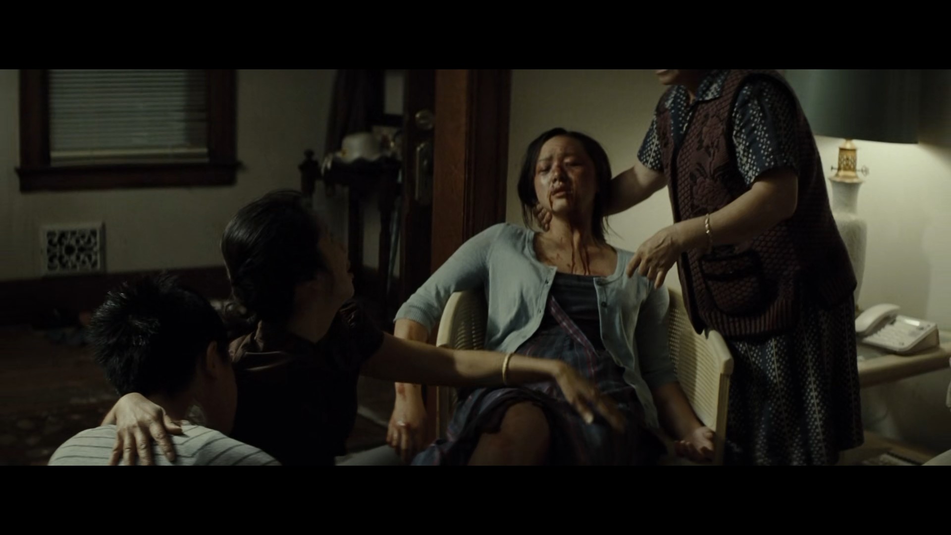 Sue Loru robbed by Hmong gangs (Source - movie Gran Torino)